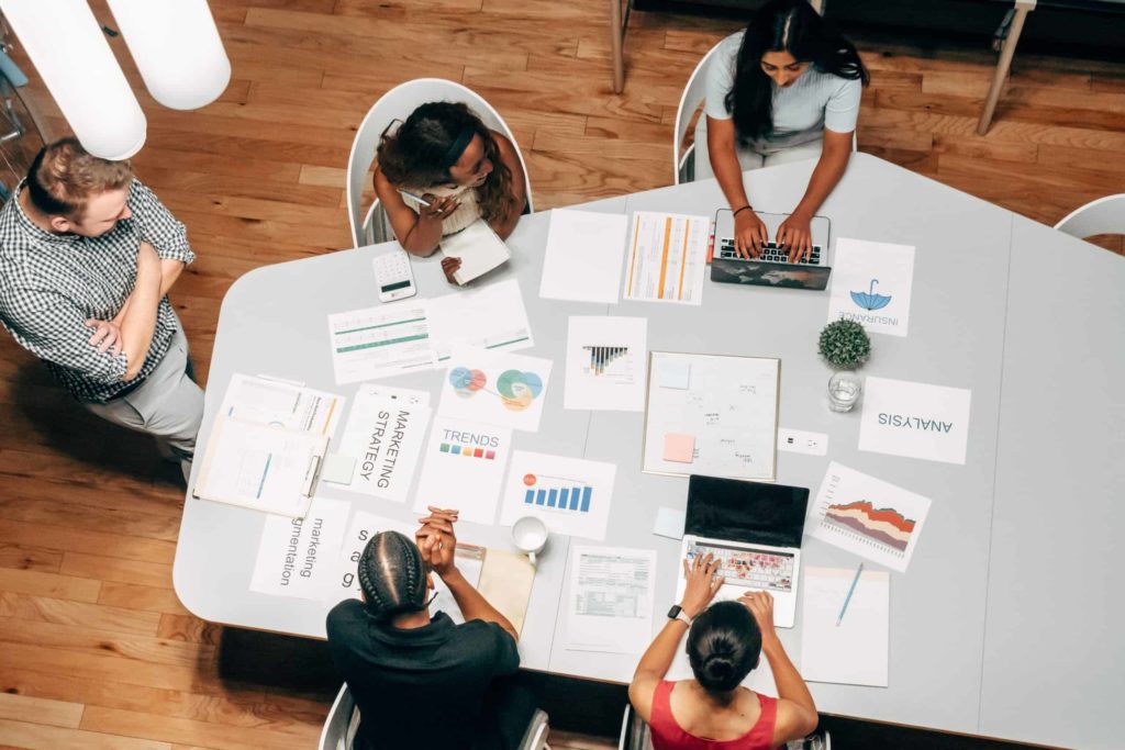 A group of people having a meeting.